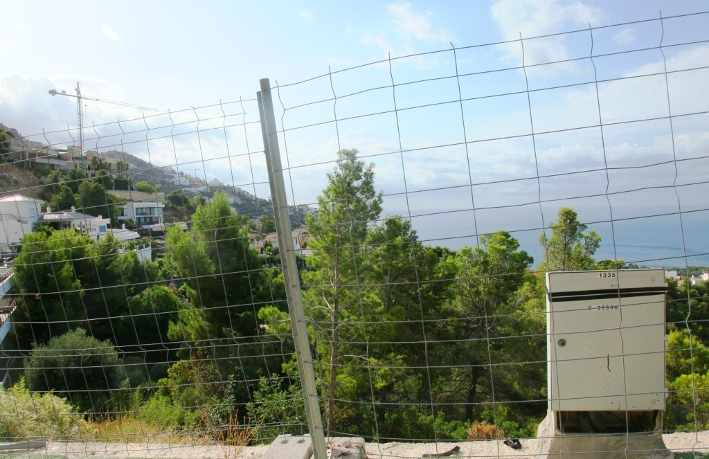 Otrolig tomt i Altea Hills med panoramautsikt över havet och bergen.